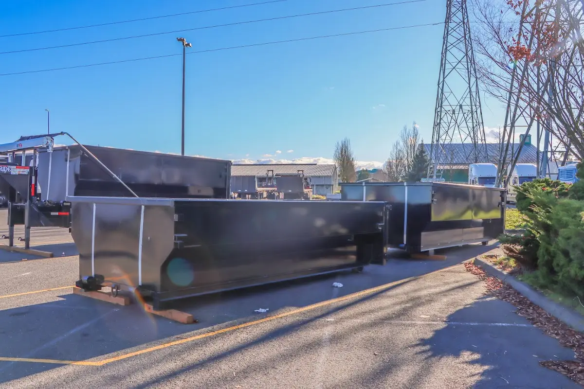 Roll-off dumpster ready for waste disposal at job site for Yard Waste Dumpster Rental in Neptune Beach